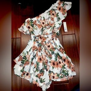 Romper, size small from Francesca’s. Beautiful and flowy and soft material.